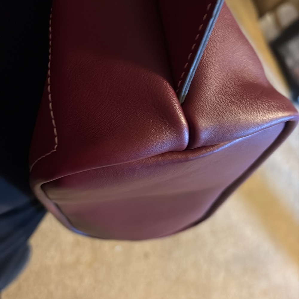 Dooney and Burke Drawstringng Backpack in color Grape. - Picture 10 of 12